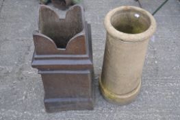 Two chimney pots, including a glazed stoneware example,