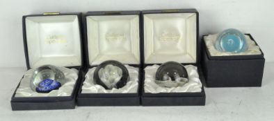 Four limited edition Caithness 1970's and 1980's glass paperweights,
