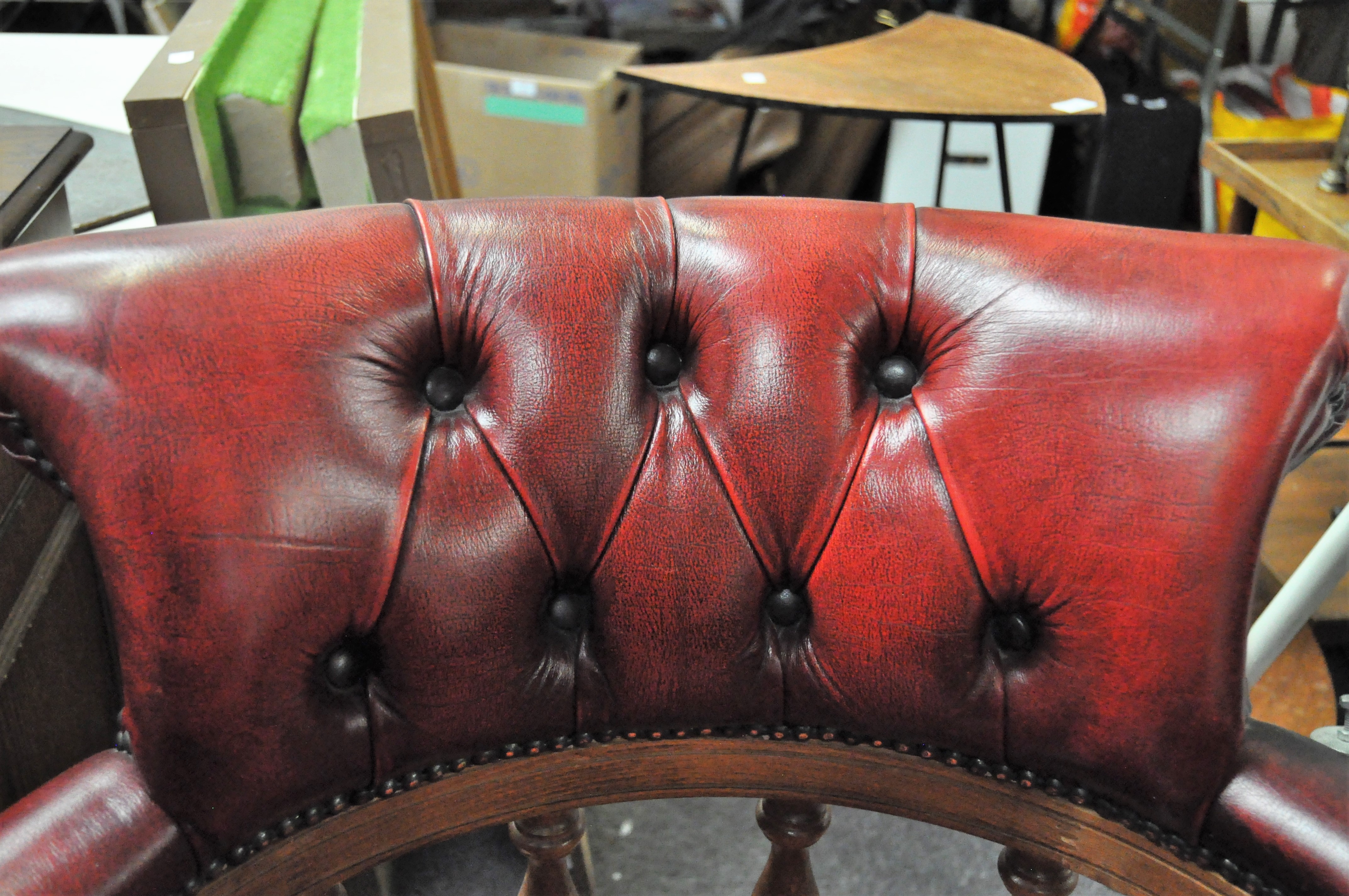 A 20th century antique style red leather Chesterfield Captain's mahogany framed swivel chair - Image 4 of 6