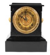 An American mantel clock, the gilt dial on an Ansonia movement striking to a gong,