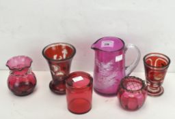 Selection of cranberry glass, comprising a Mary Gregory style vase decorated with a courting couple,