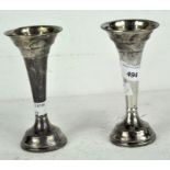 A pair of silver trumpet shaped vases, hallmarked Birmingham 1965 by Broadway & Co,