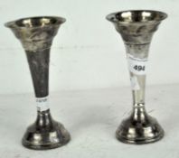 A pair of silver trumpet shaped vases, hallmarked Birmingham 1965 by Broadway & Co,