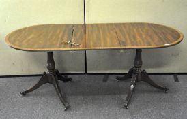 A Regency style mahogany extending dining table, 20th century, with single leaf,