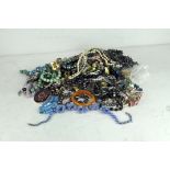 An extensive collection of assorted costume jewellery, comprising bracelets,