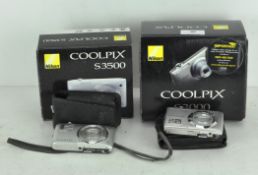 Two Nikon Coolpix cameras, comprising a S3000 and a S3500,