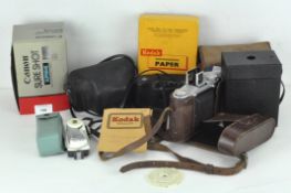 A selection of film cameras including an Ensign Self ix 12-20,