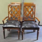 Four mid 20th century dining chairs, including two carvers, each with trellis pattern backs,