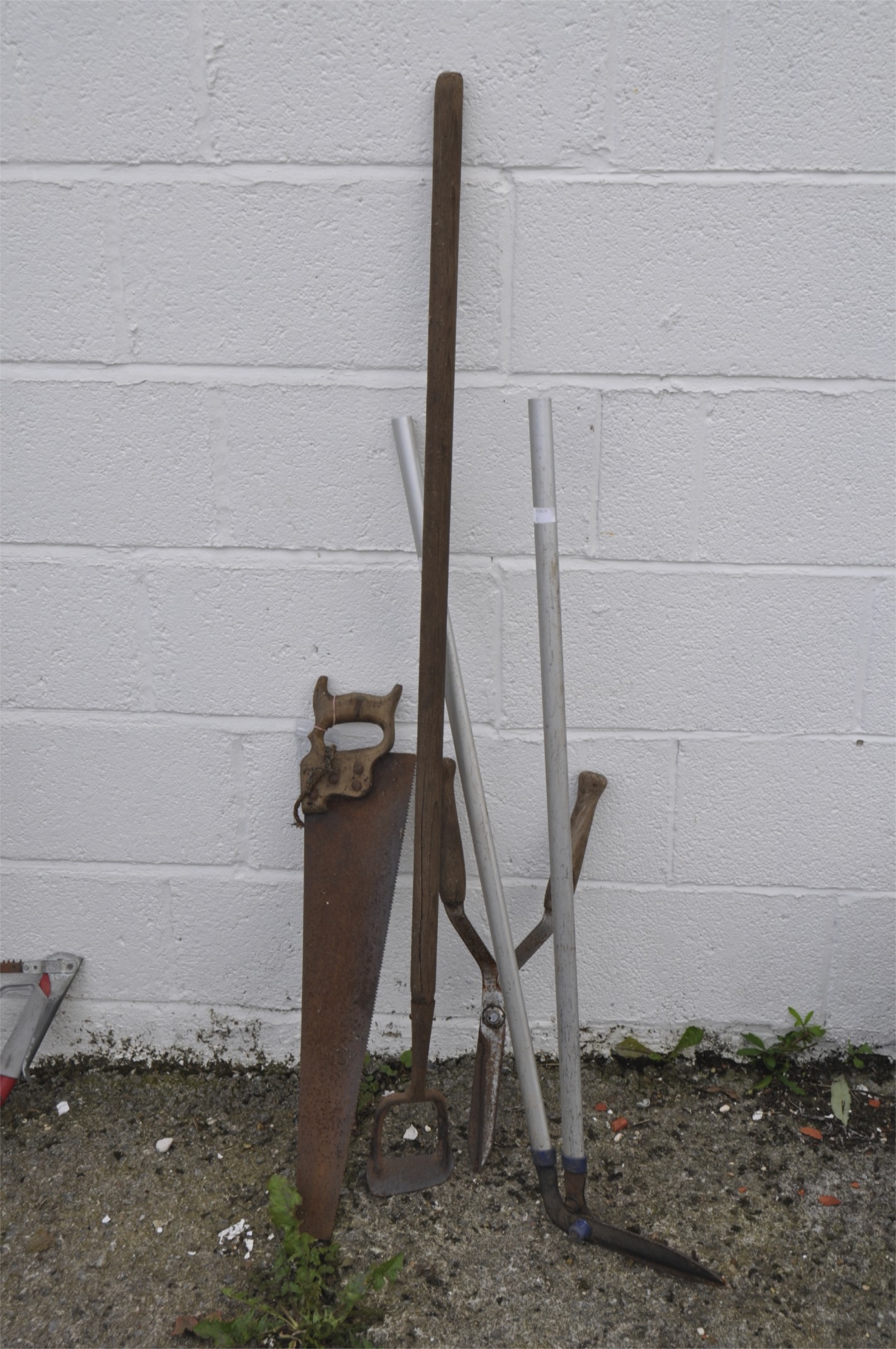 A quantity of tools including a hoe, a saw, - Image 2 of 2