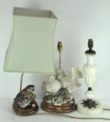 Three table lamps, a pair of doves and an owl and one marble style baluster vase with brass details