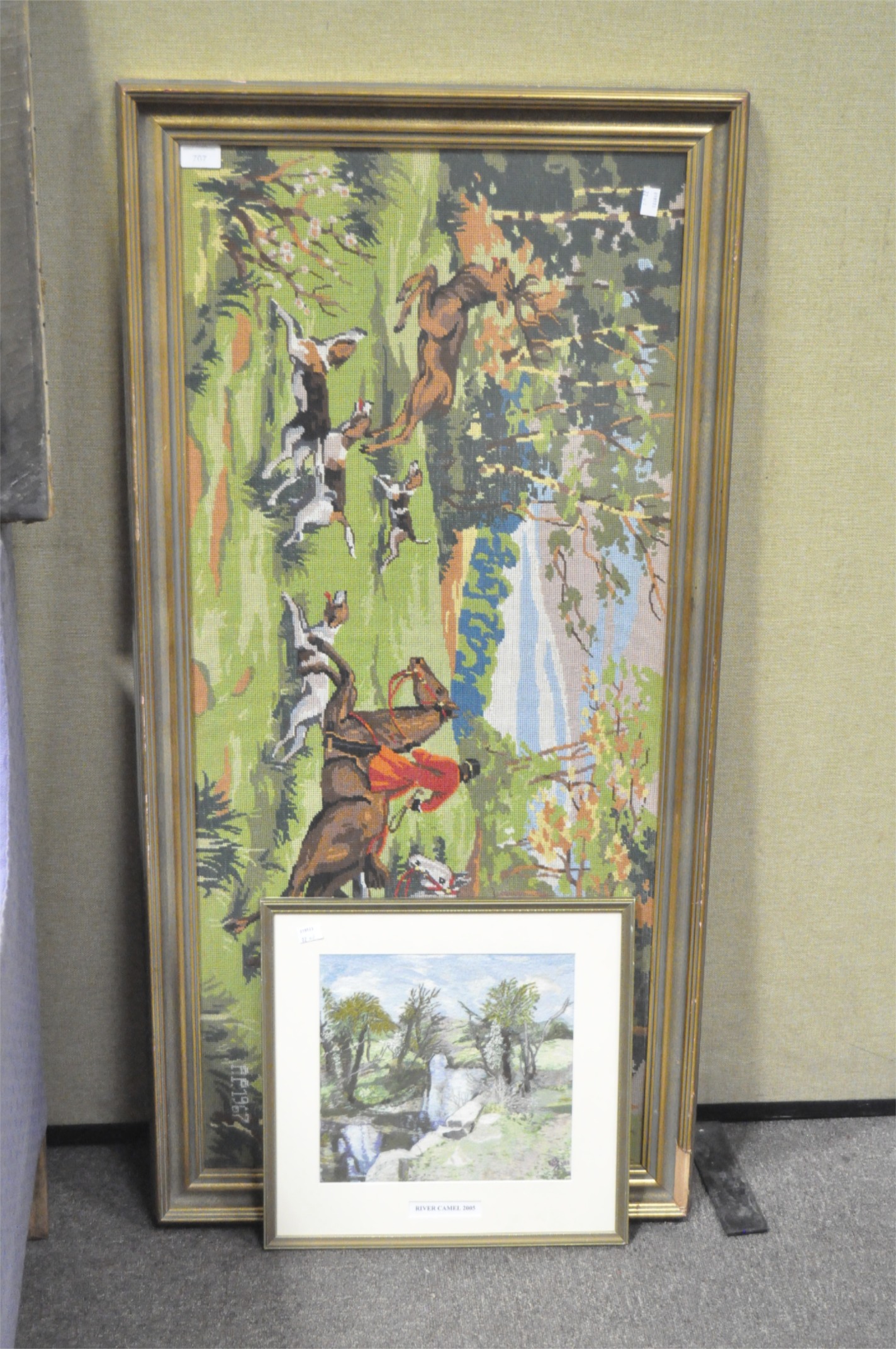 A needlework tapestry depicting a hunting scene, mounted in gilt frame,