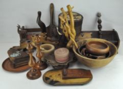 A quantity of 20th century treen including animal figures, candlesticks, bowls, boxes,