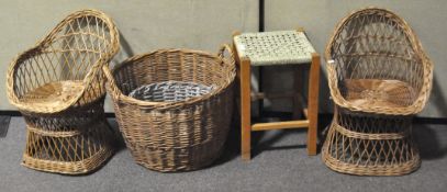 Two wicker baskets, two wicker child's seats and a stool,