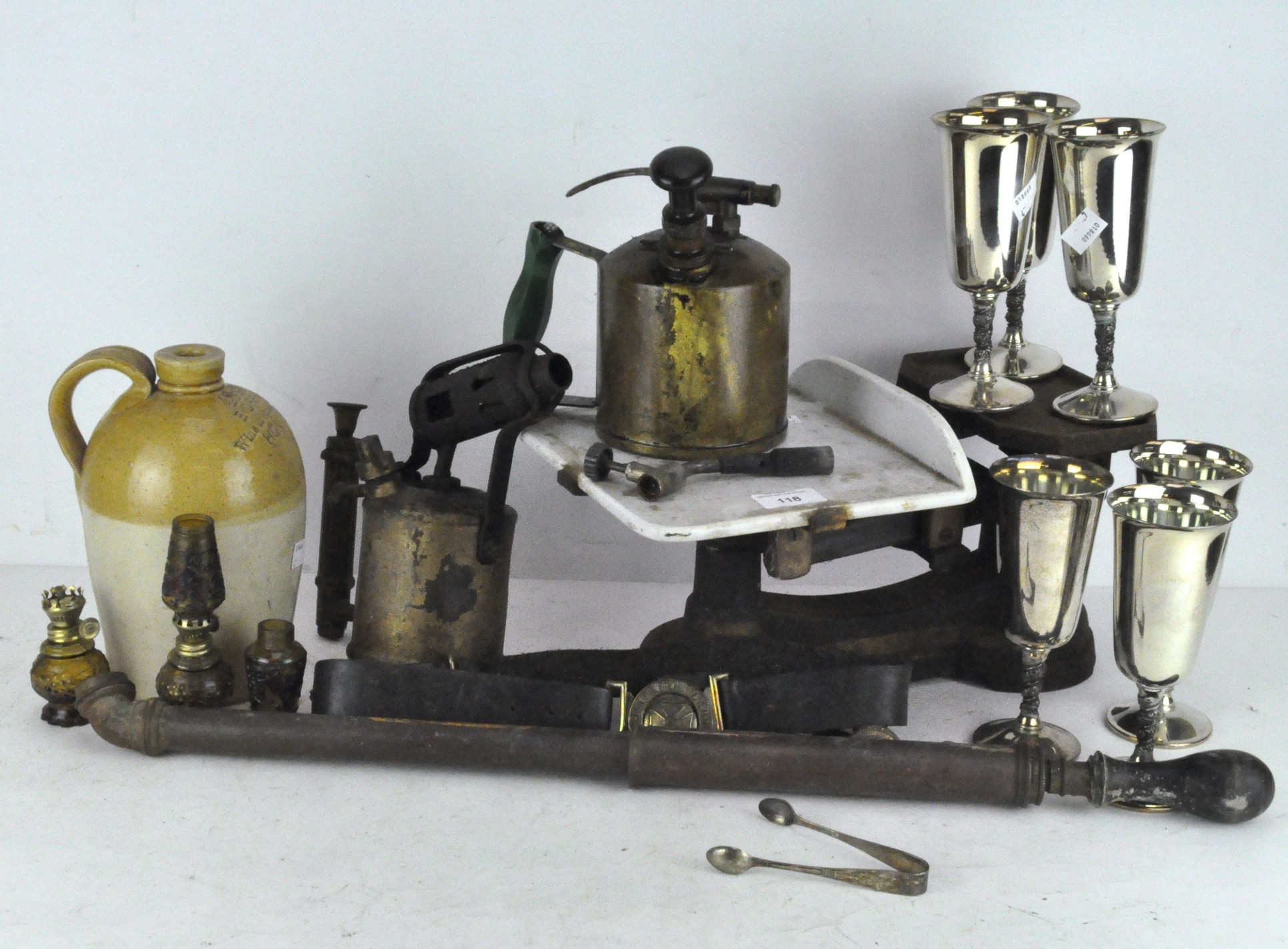 Assorted collectables, including a stoneware wine storage bottle marked E Drewe Honiton, scales,