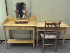 Two pine rectangular writing tables with lower drawers,