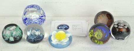 A collection of seven Caithness glass paperweights, comprising; Piatto Azzuro 49/250,