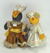 Two stuffed animal door stops modelled as a rabbit and a bear,