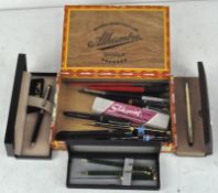 A selection of pens, comprising boxed Colibri and Cross ballpoints, together with Parker ballpoints,