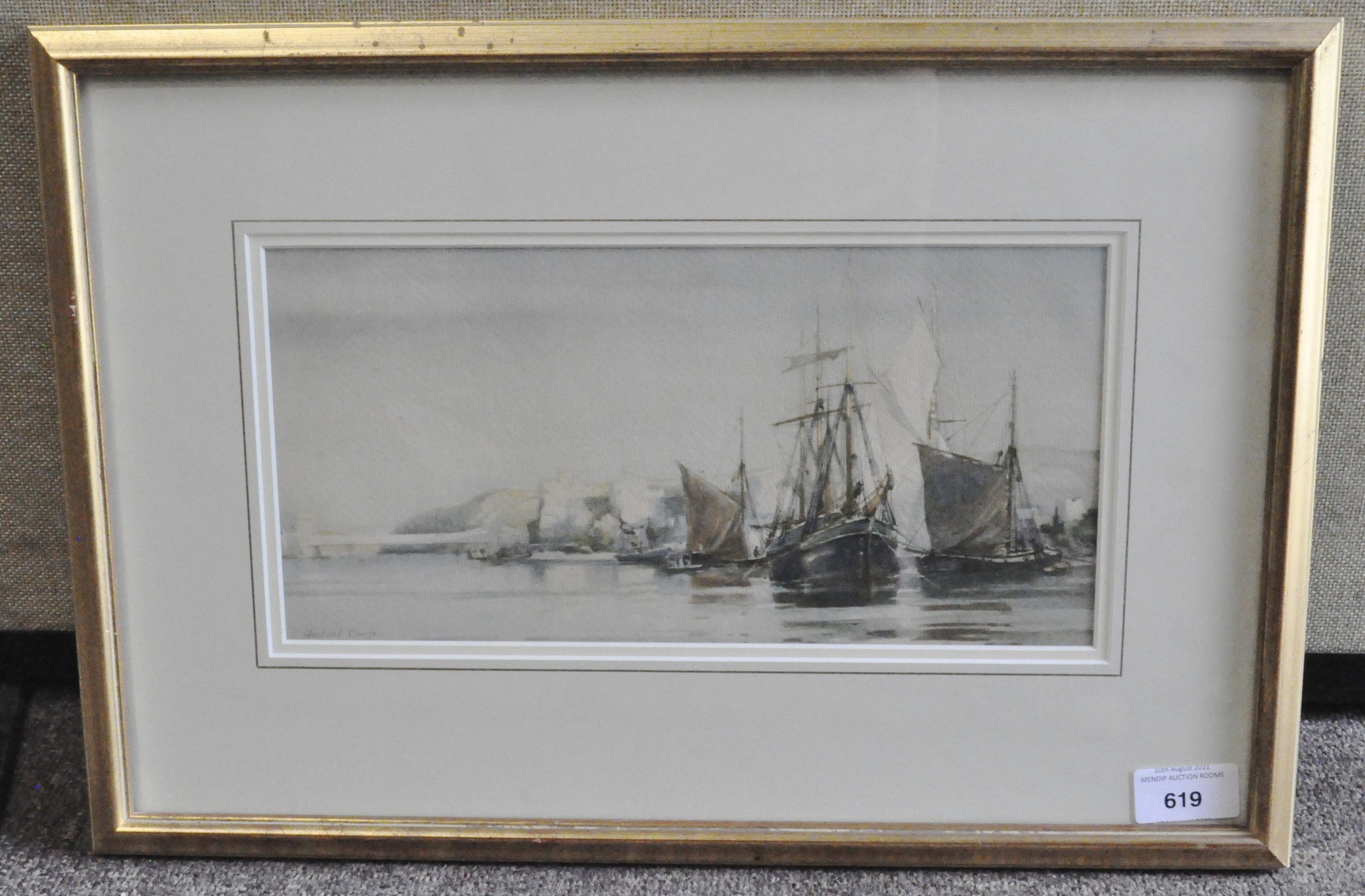 A print after a Hubert Coop (1872-1953), sailing boats in harbour, framed,