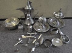 A collection of Omani white metal items, 20th century, including: a coffee pot and cover,