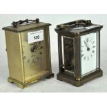 A 20th century carriage clock, white dial with Roman numerals, in a brass case with glass panels,