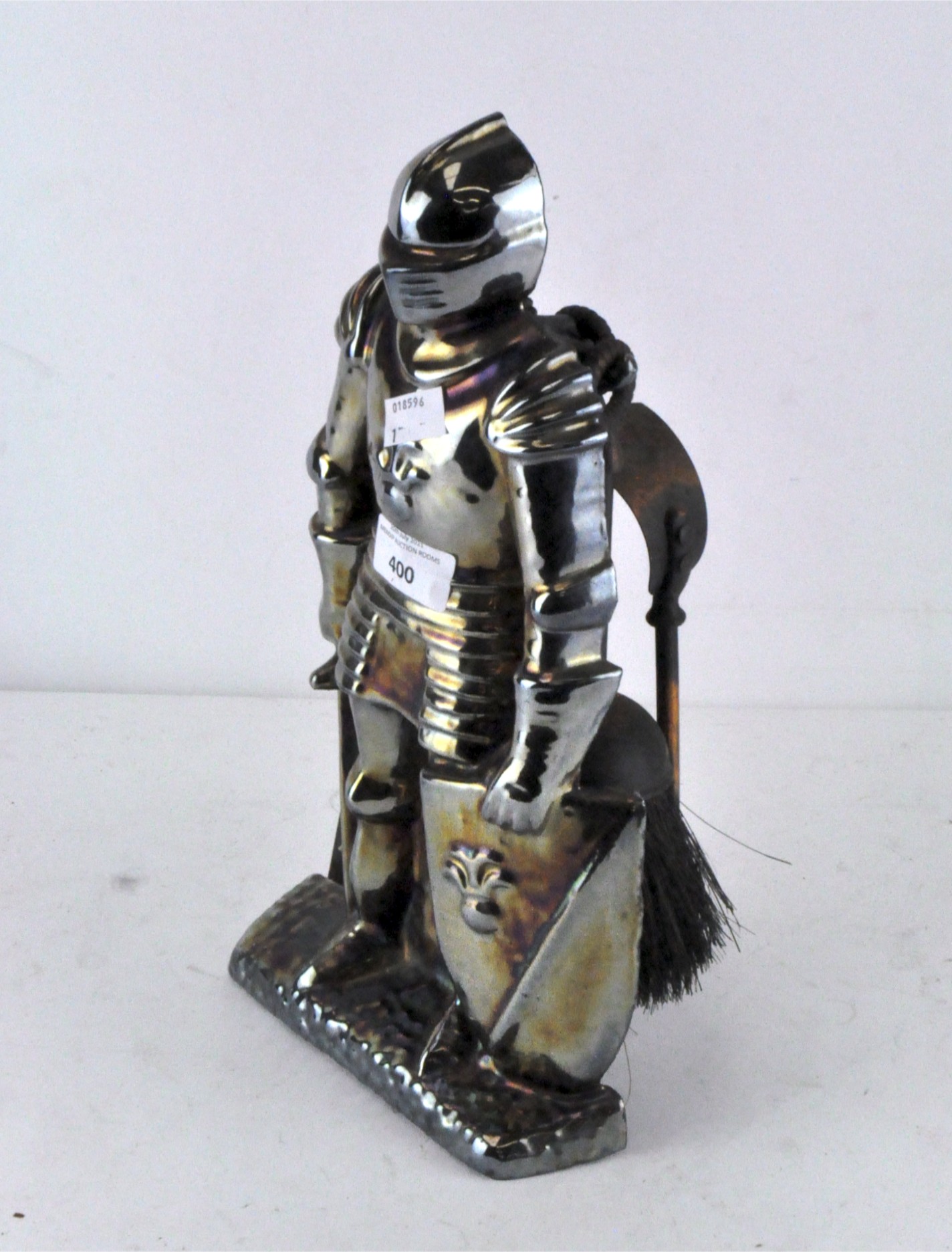 A Knights fireside companion set,