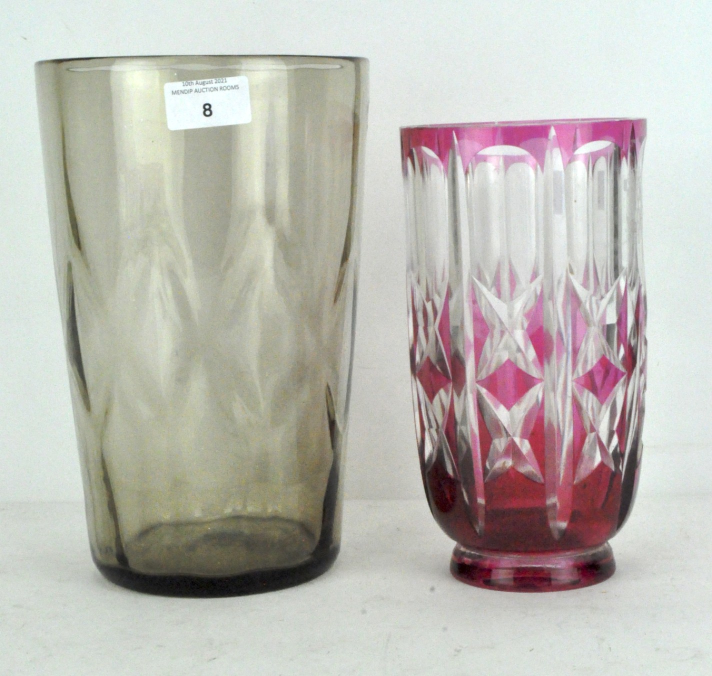 A large moulded glass vase with circular base, height 26cm,