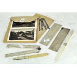 A selection of early 20th century ivory and bone measuring rulers and a letter opener,