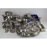 A large quantity of silver plate to include rose bowls, candlesticks, trays, dishes,