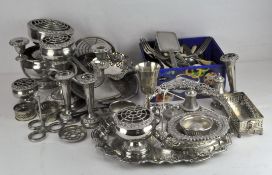 A large quantity of silver plate to include rose bowls, candlesticks, trays, dishes,