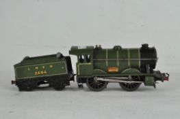 A Hornby O Gauge No 1 Special Clockwork Locomotive and Tender, 0-4-0 in LNER green livery,