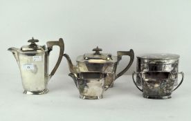 Art Deco silver plated part tea service including a teapot and cover, a coffee pot and cover,