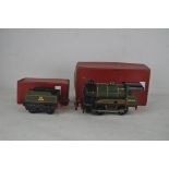 A Post War Hornby O Gauge Type 51 clockwork locomotive and tender, 0-4-0 in green BR lined livery,