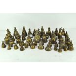 A collection of fifty vintage brass bells, cast as ladies in crinolines and other examples