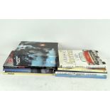 A quantity of reference books about cars, planes and trains, including 'Spitfire' by Robert Jackson,