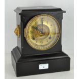 An American mantel clock, the gilt dial on an Ansonia movement striking to a gong,