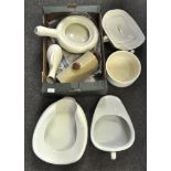 A collection of chamber pots and bed pans to include a Bristol slipper chamber pot