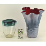 Three pieces of Studio Art Glass, including a frill shaped cased vase with bubble inclusions,