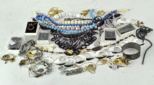 A quantity of costume jewellery including necklaces, pendants,