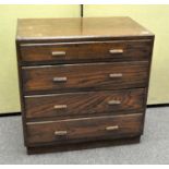 A mid century four drawer oak chest of drawers,