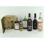 A collection of spirits including a miniature bottle of Glenmorangie 10 year old Scotch Whisky,