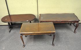 A group of three sofa tables,