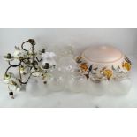 A three branch ceramic chandelier, corresponding pair of two branch wall lights and a single light,