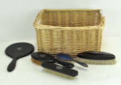 An Edwardian ebonised part dressing table set,