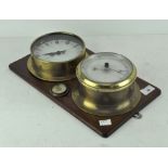 A brass bound wooden mounted clock and hygrometer, early 20th century,