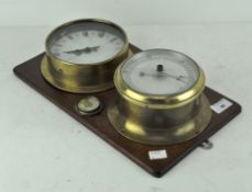 A brass bound wooden mounted clock and hygrometer, early 20th century,