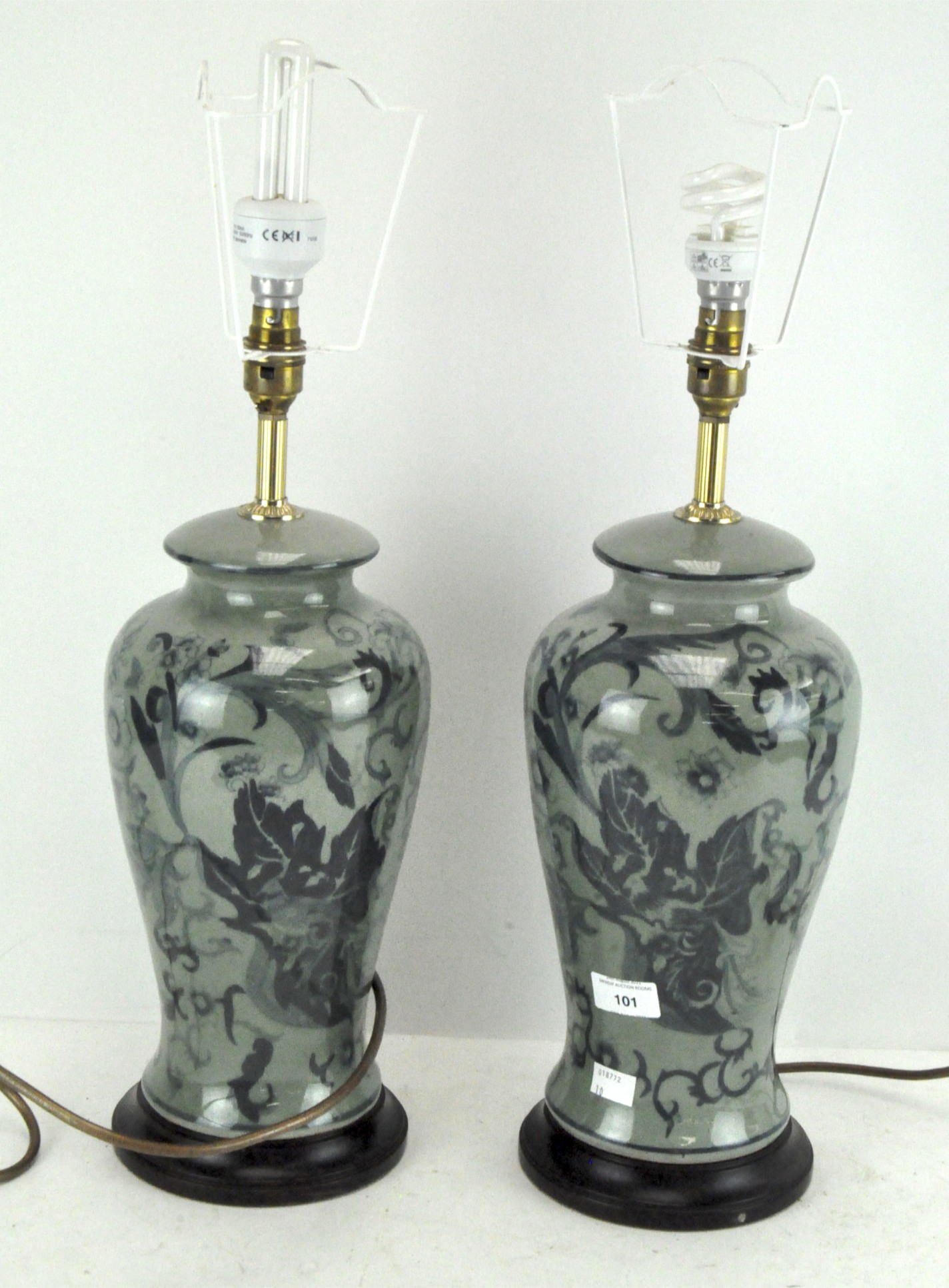 A pair of Chinese celadon ground lamp bases,