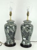 A pair of Chinese celadon ground lamp bases,