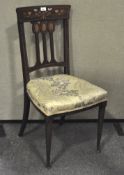 An early 20th Century dining chair,