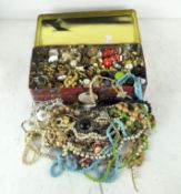A collection of assorted costume jewellery, including chains,